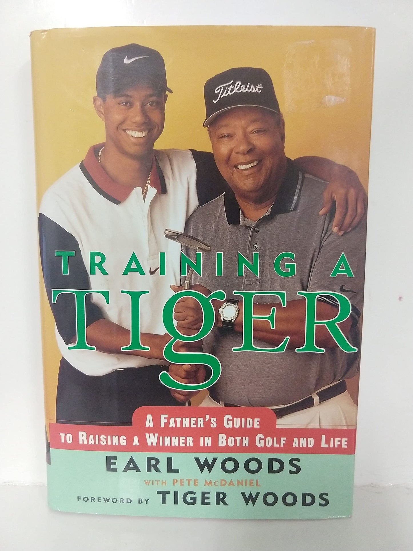 Training a Tiger: A Father's Guide to Raising a Winner in Both Golf and Life The Happy Book Stack