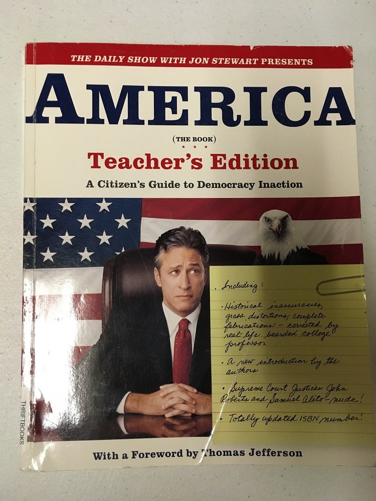 THE DAILY SHOW WITH JON STEWART PRESENTS AMERICA (THE BOOK): A Citizen's Guide to Democracy Inaction The Happy Book Stack
