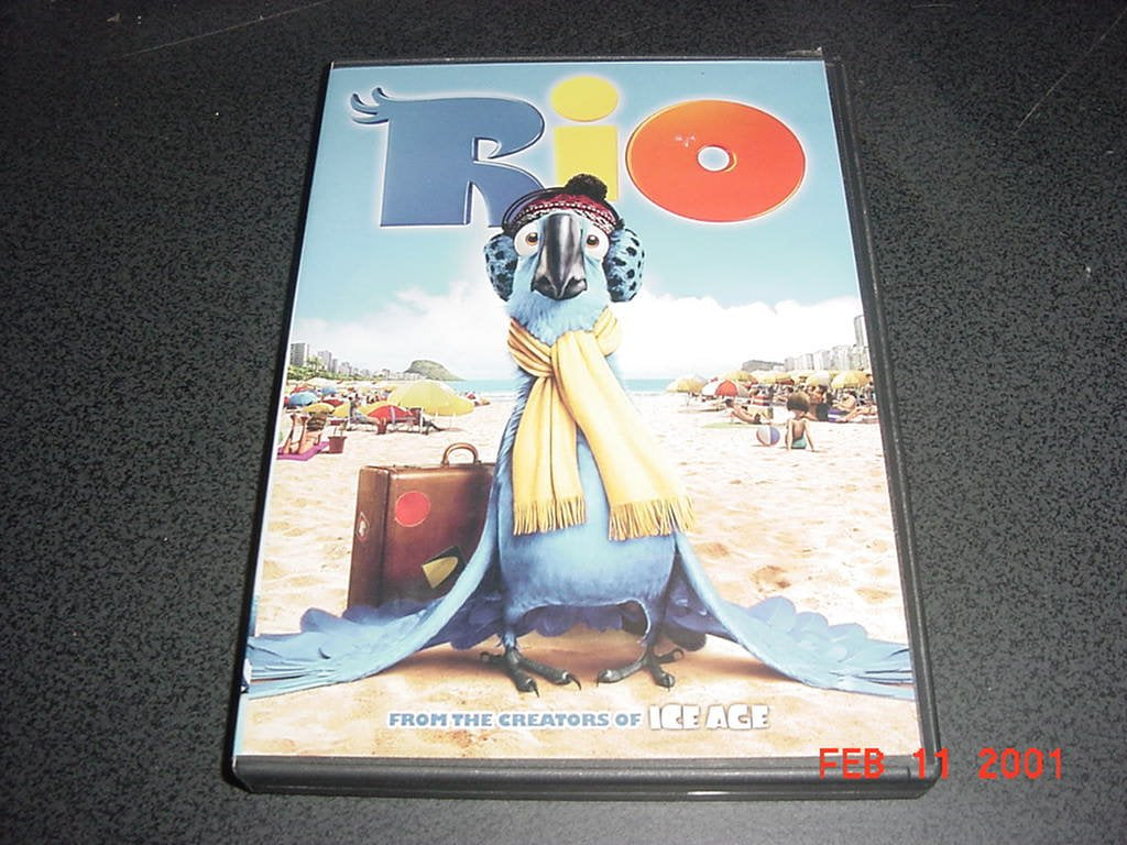 DVD Video Of RIO With Anne Hathaway, Jason Eisenberg and George Lopez. Animated Feature Movie. The Happy Book Stack