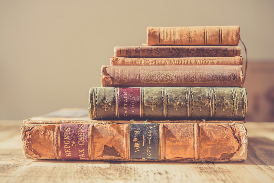 A stack of books – 100 Books Every Student Should Read Before Graduating High School