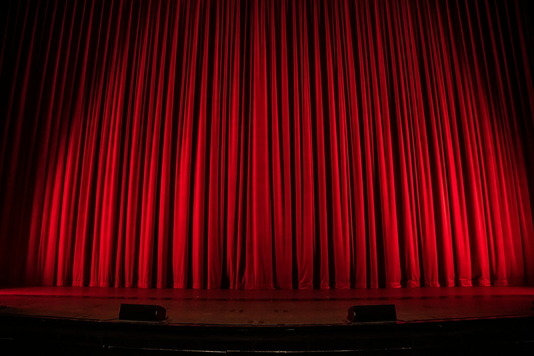 A red theater curtain – Shakespeare Plays in Order