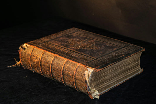 An old hardbound book on a table – Best American History Books for Homeschool Students
