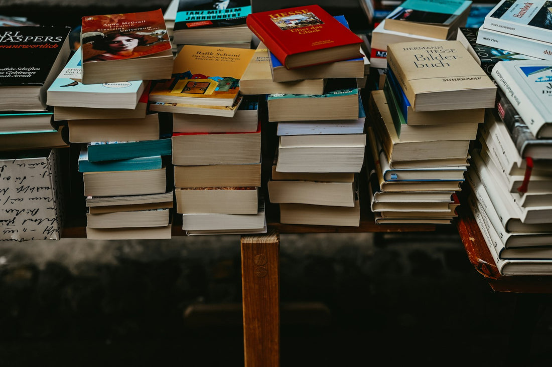 A pile of used books on a table – How to Buy Books on a Budget for Your Family