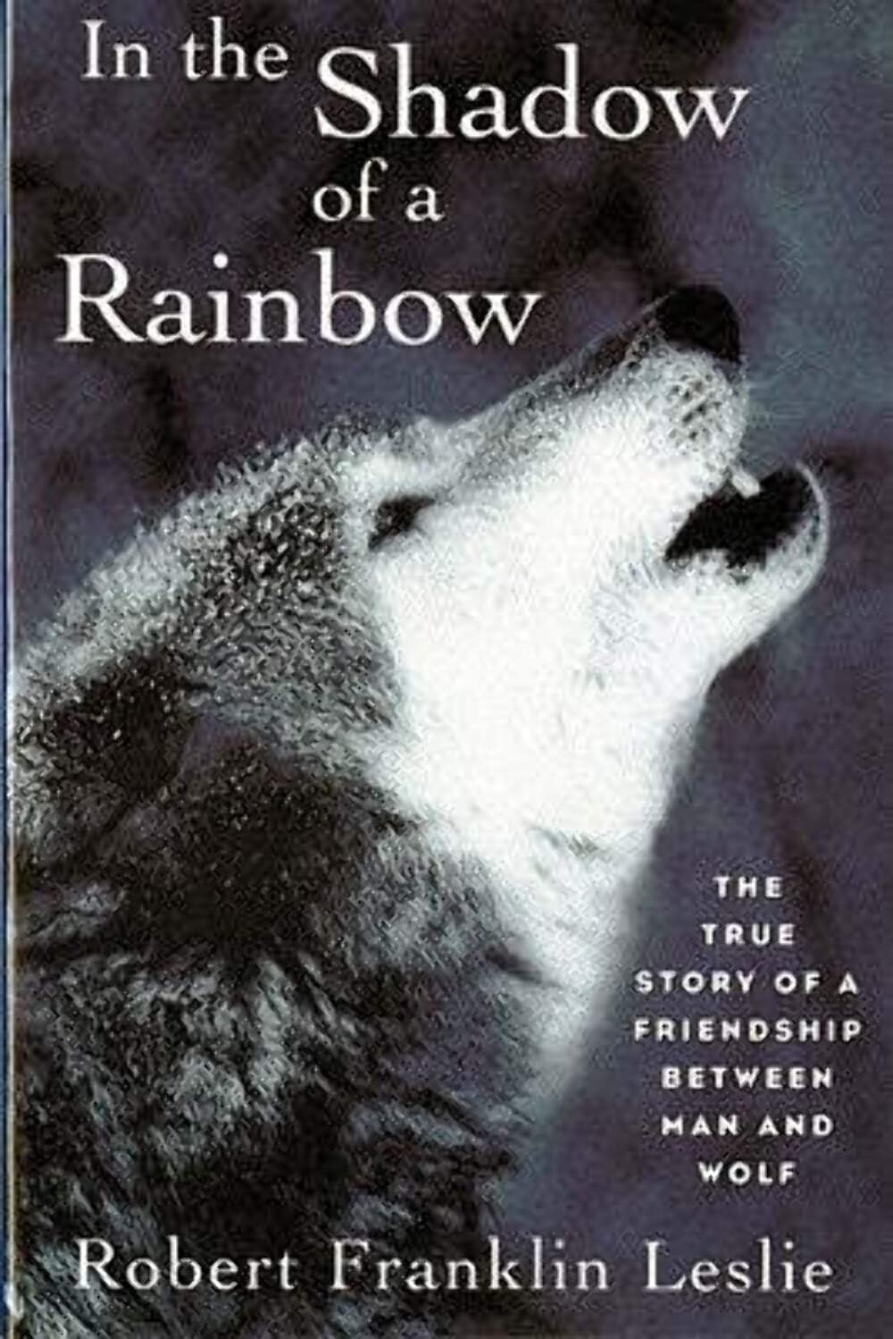 In the Shadow of a Rainbow: The True Story of a Friendship Between Man and Wolf The Happy Book Stack