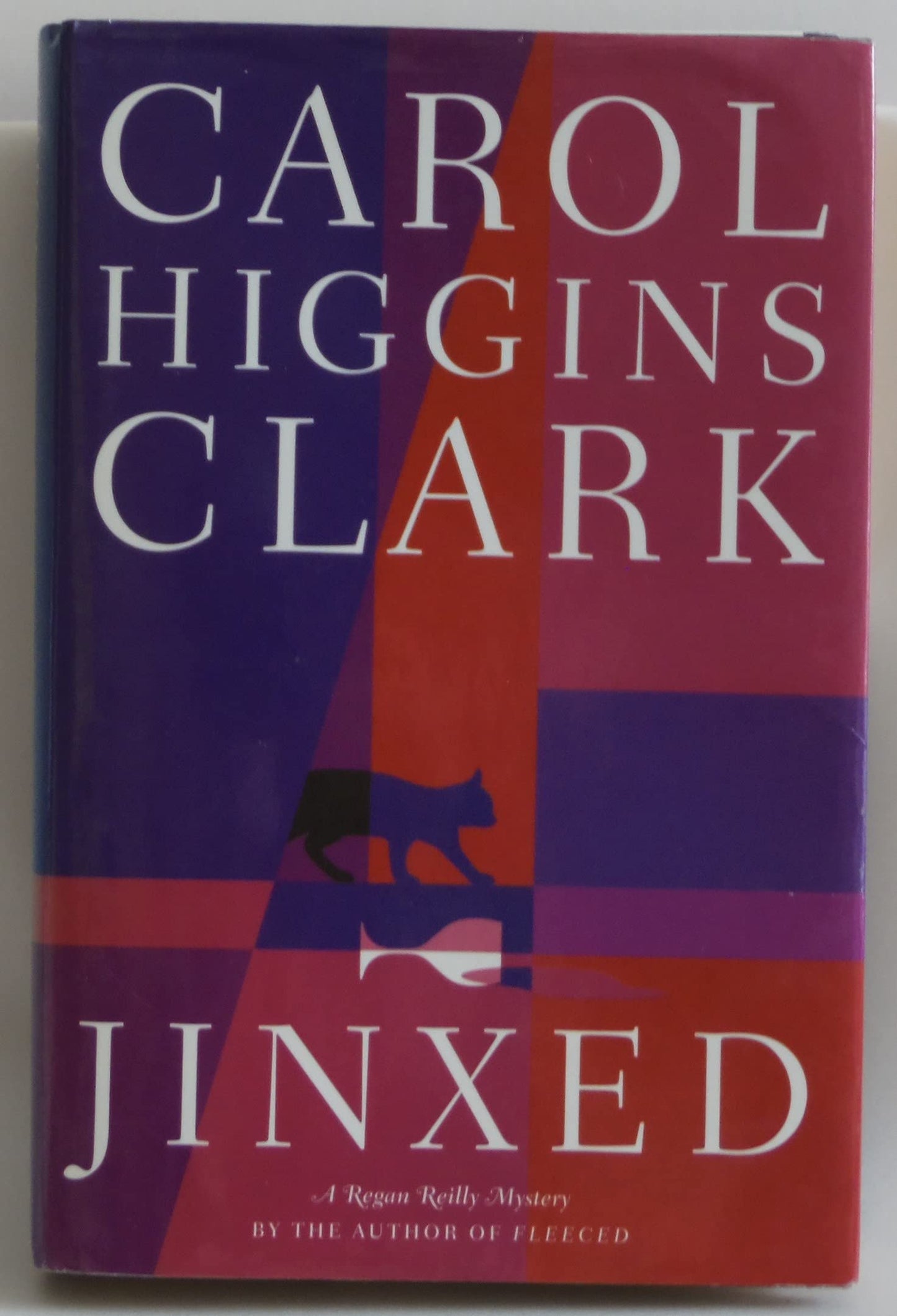 Jinxed (Regan Reilly Mysteries, No. 6) The Happy Book Stack