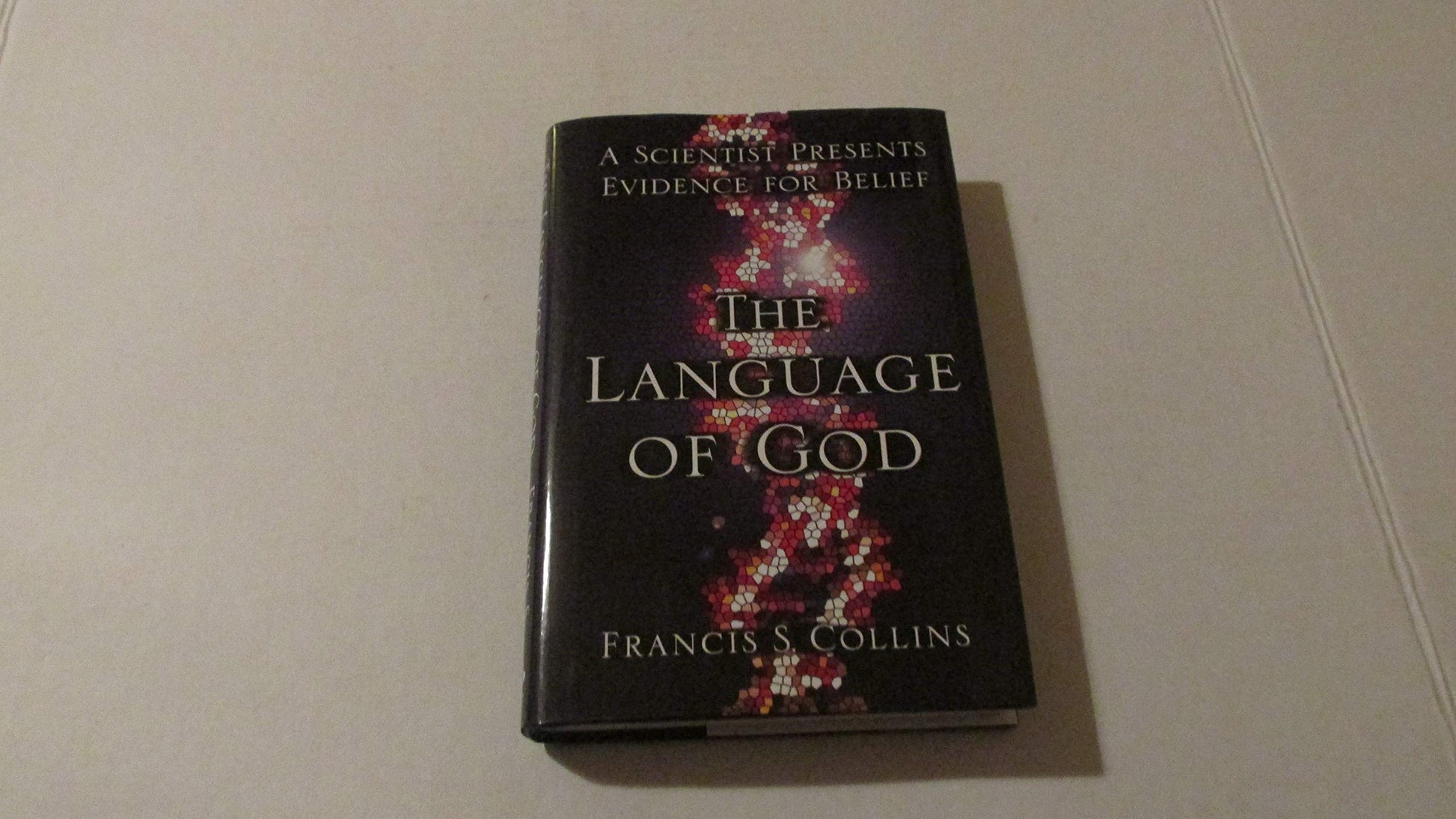 The Language of God: A Scientist Presents Evidence for Belief The Happy Book Stack