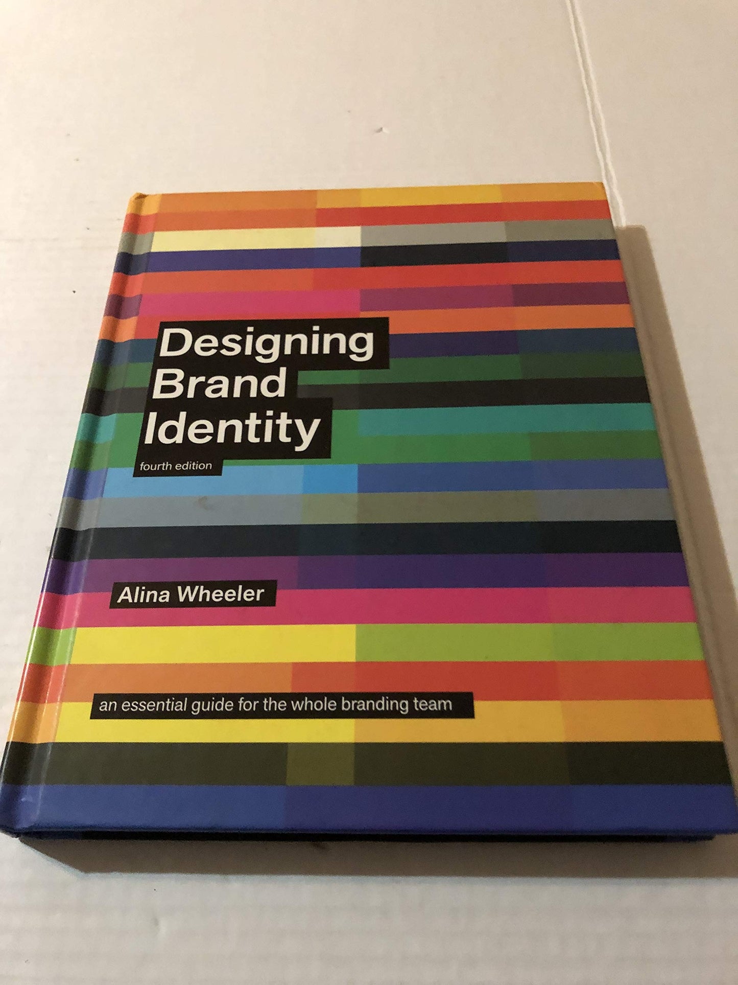 Designing Brand Identity: An Essential Guide for the Whole Branding Team, 4th Edition The Happy Book Stack
