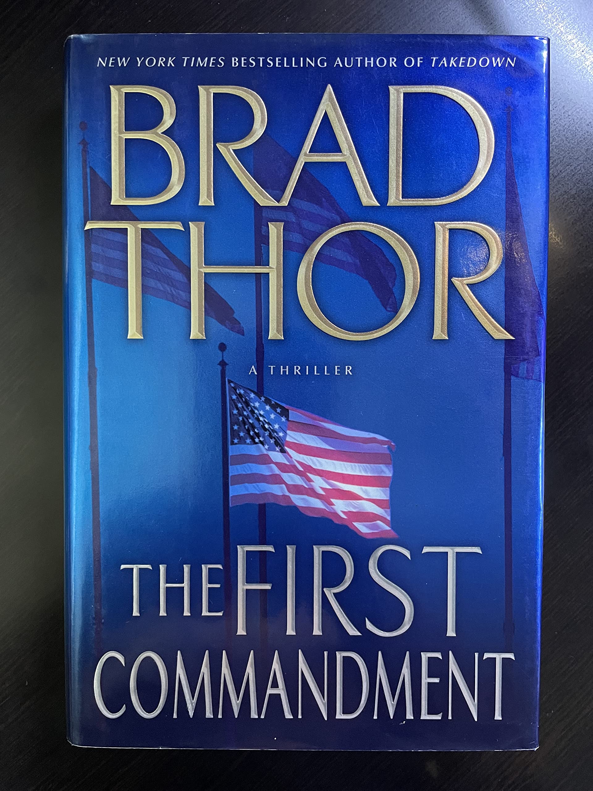 The First Commandment (Scot Harvath, Bk 6) The Happy Book Stack